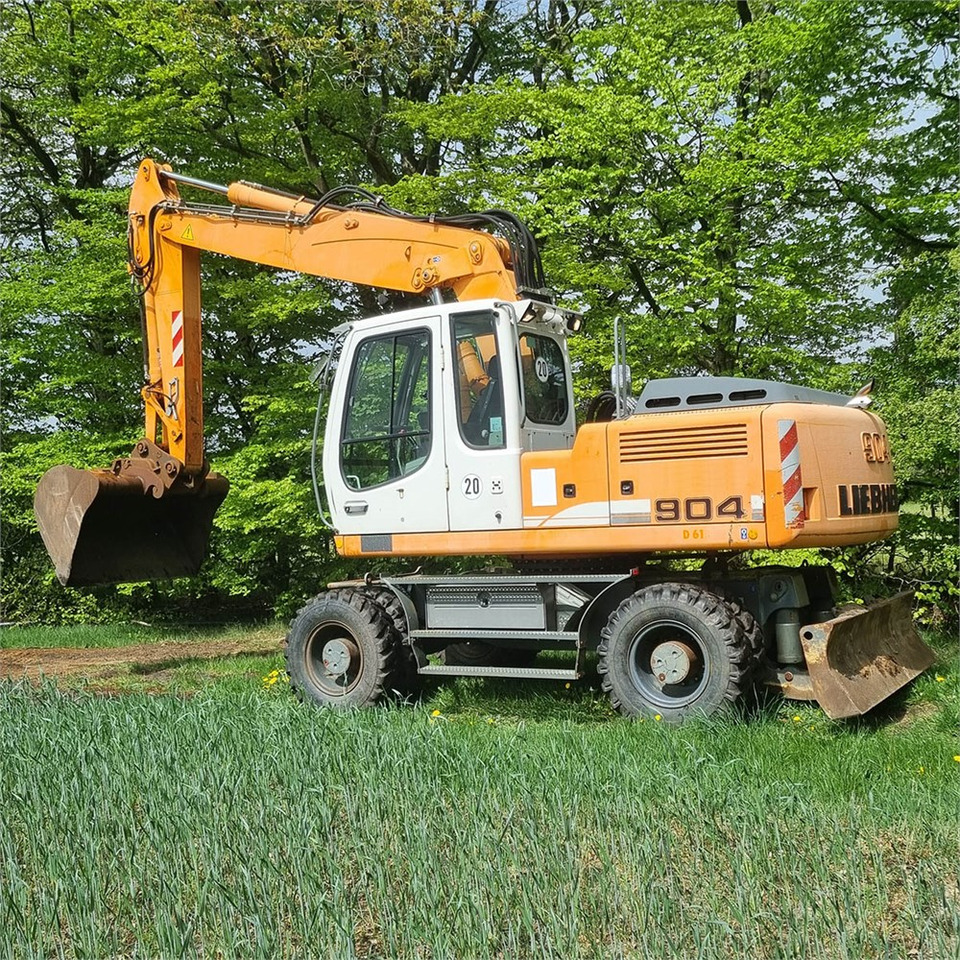 Pelle sur pneus Liebherr A904 C Litronic: photos 3