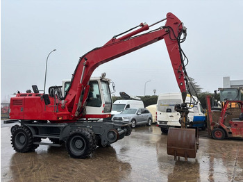 Pelle sur pneus Liebherr A900. Kamera.: photos 5