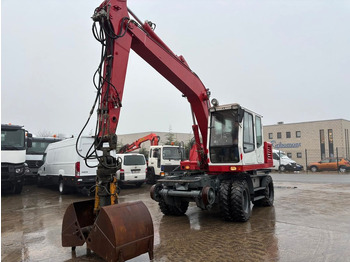 Pelle sur pneus Liebherr A900. Kamera.: photos 2