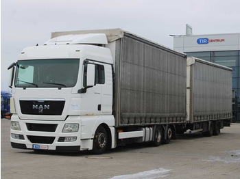 Camion à rideaux coulissants MAN TGX 24.440