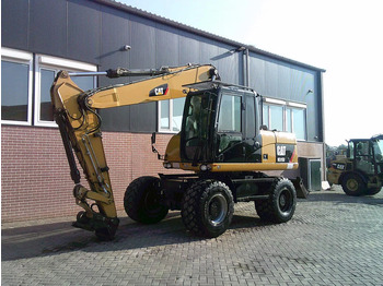 Pelle sur pneus CATERPILLAR M315D