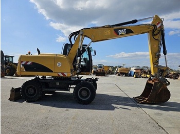 Pelle sur pneus Caterpillar M315D: photos 4