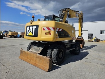 Pelle sur pneus Caterpillar M315D: photos 3