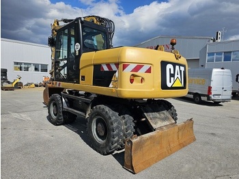 Pelle sur pneus Caterpillar M315D: photos 2