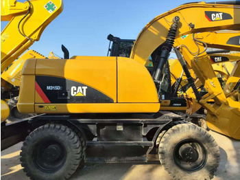 Pelle sur pneus CATERPILLAR 315D