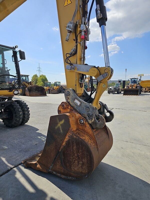 Pelle sur pneus Caterpillar M315D: photos 13